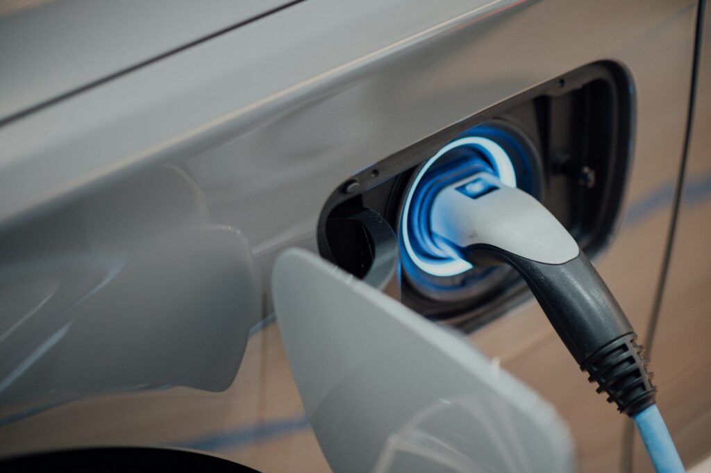 electric vehicle charger plugged into car